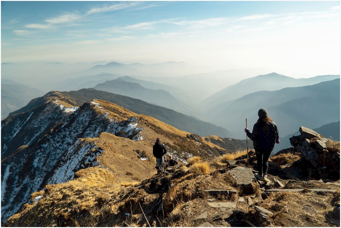 person on top of mountain during daytime